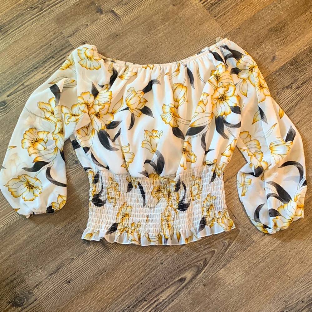 Floral blouse in cream, black and yellow by Susie Shier.